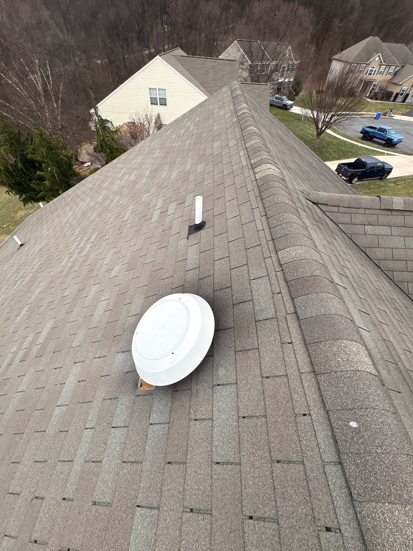 Completed asphalt shingle roof replacement on a residential property along Myrtle Court in New Cumberland, PA by Joyland Roofing.
