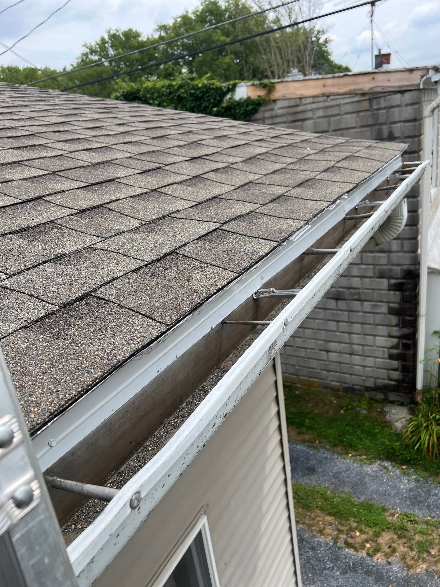 Roof edge and gutter system repaired on Noble Street in Reading, PA to improve drainage and prevent water damage.