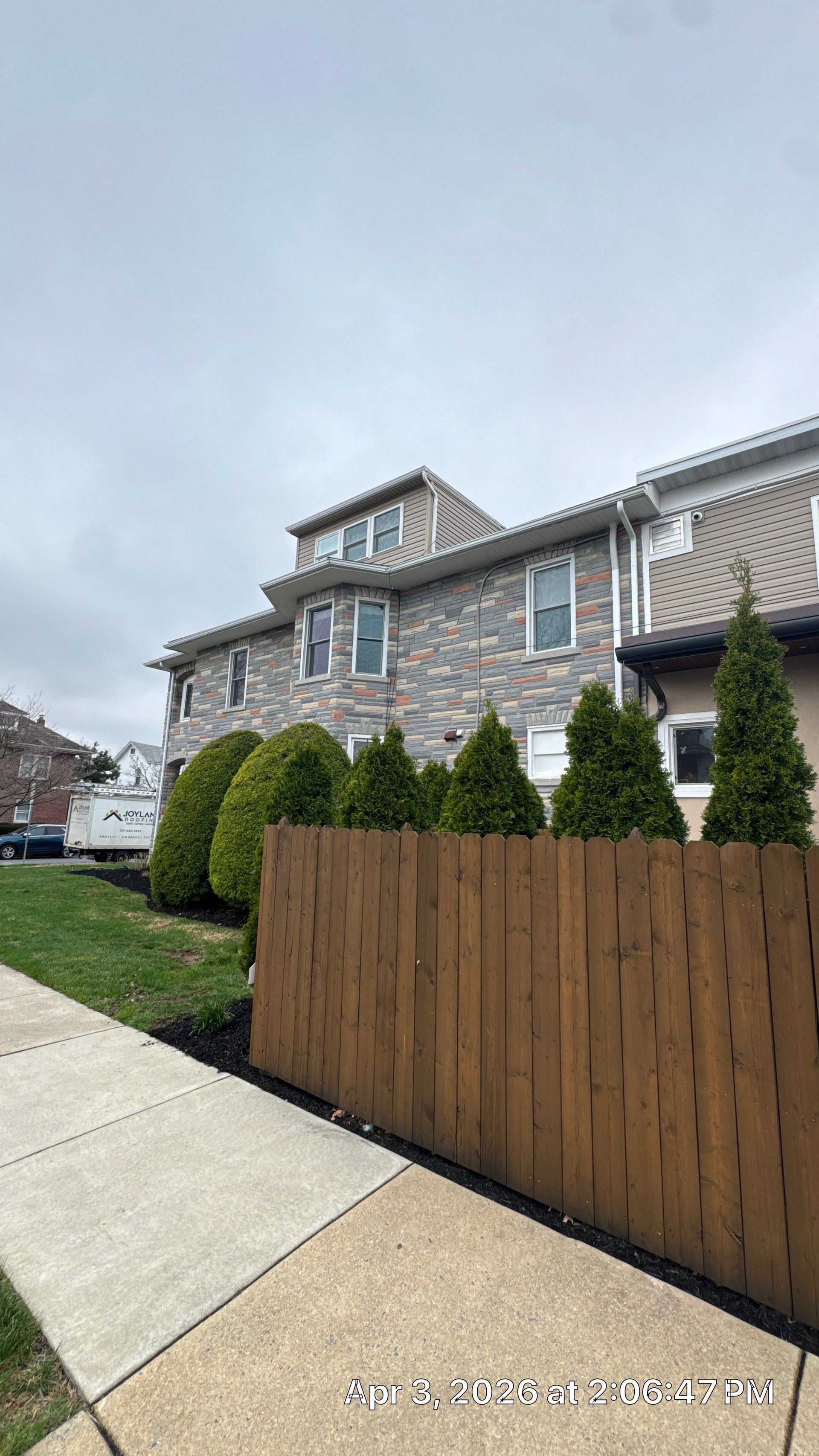 Roof repair completed on an asphalt shingle roof along Noble Street in Reading, PA.
