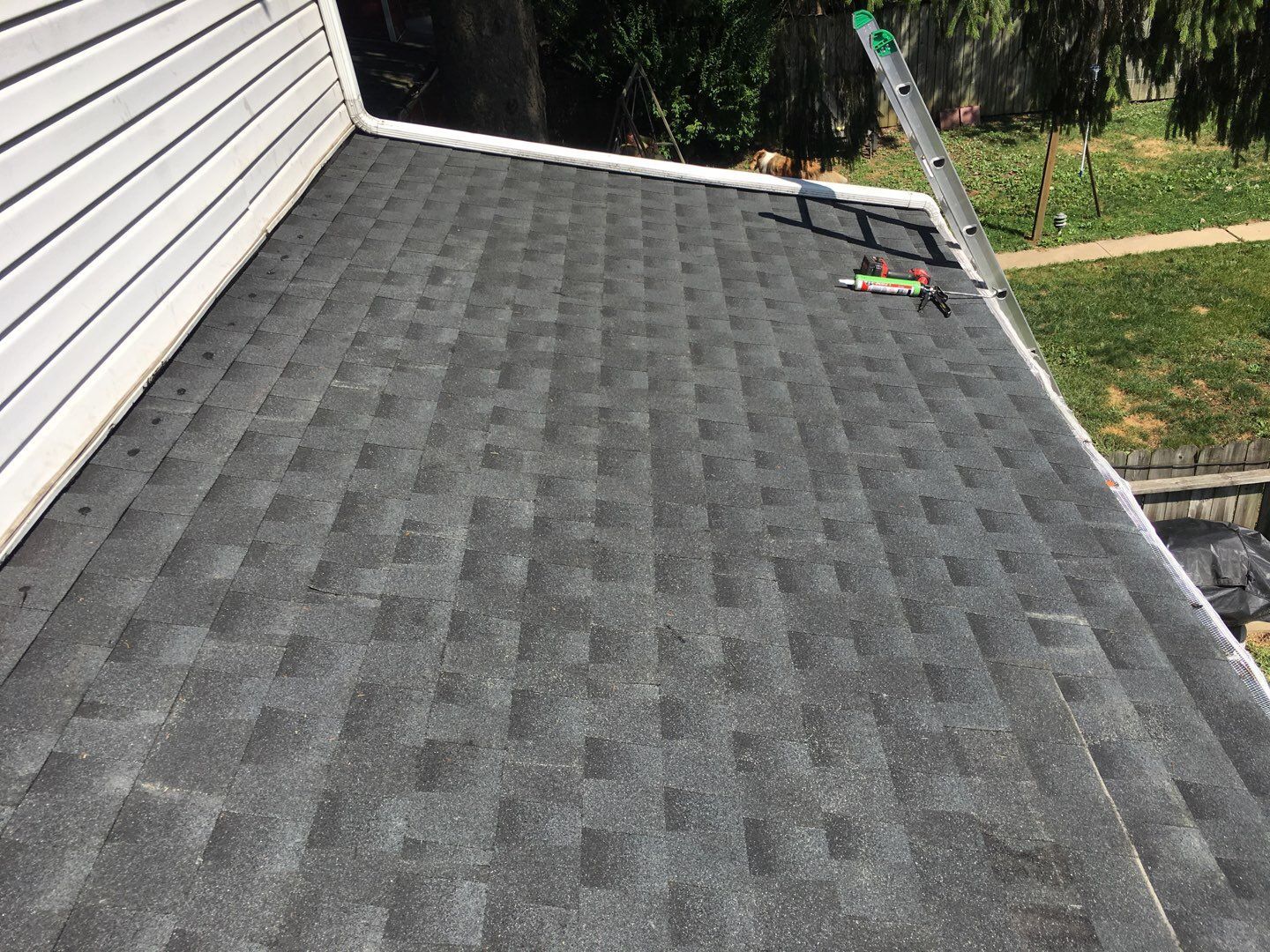 Completed asphalt shingle roof replacement on a home in North College Street, Myerstown, PA.