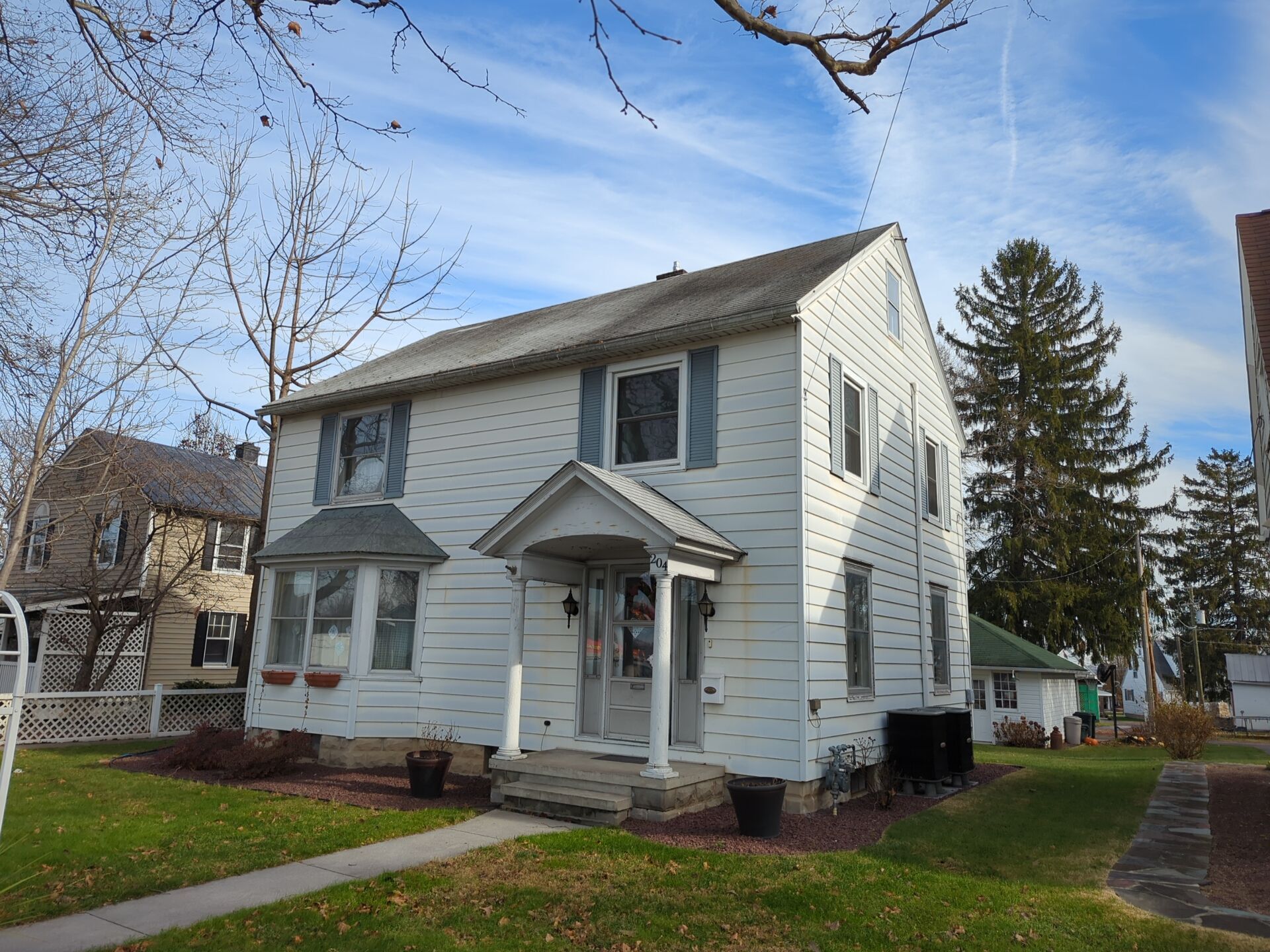 Single-family home prepared for a roof replacement project on North College Street in Myerstown, PA.