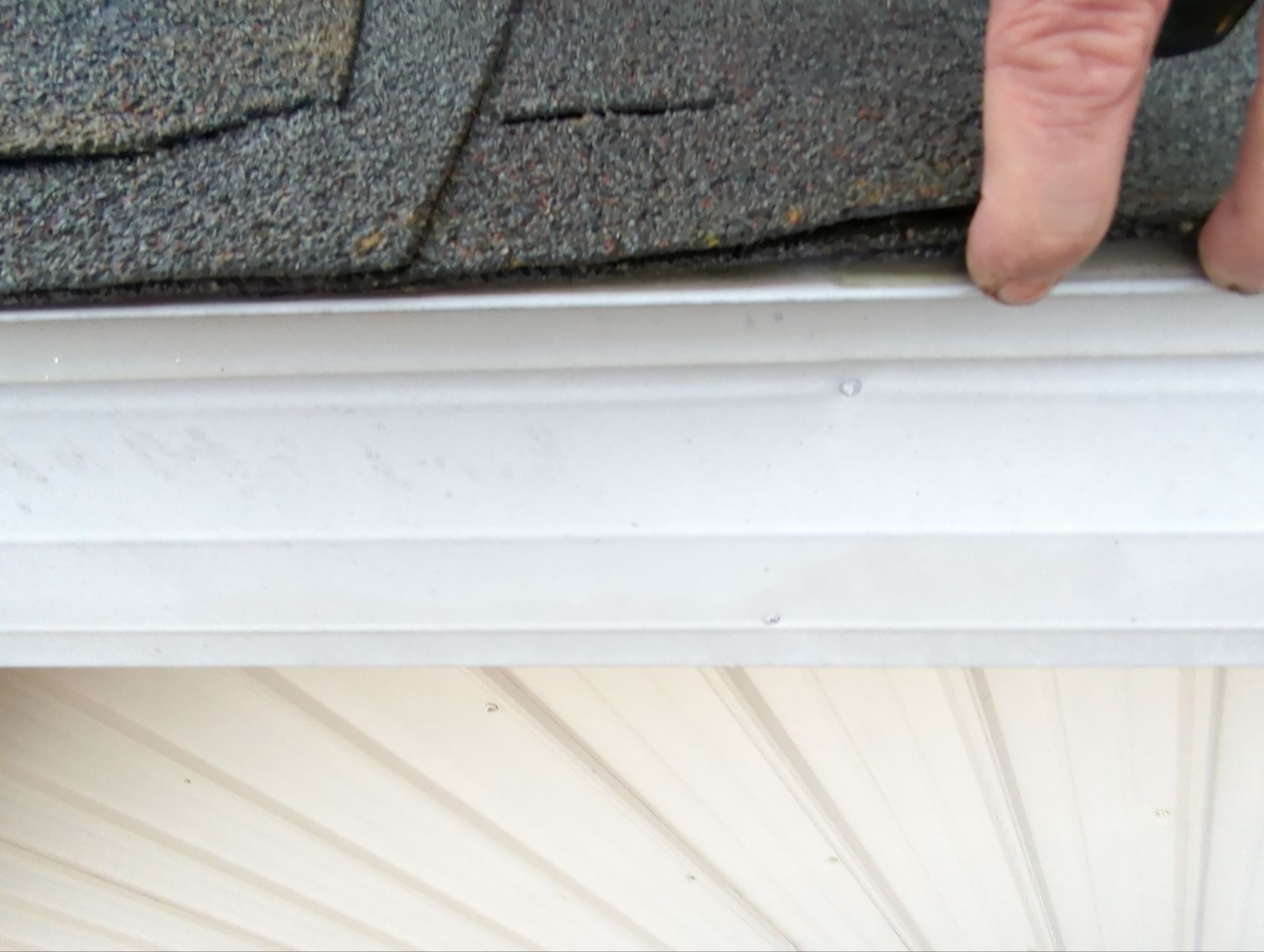 Roof edge and shingle transition inspected during a residential roof replacement project on North Kemp Street in Kutztown, PA.