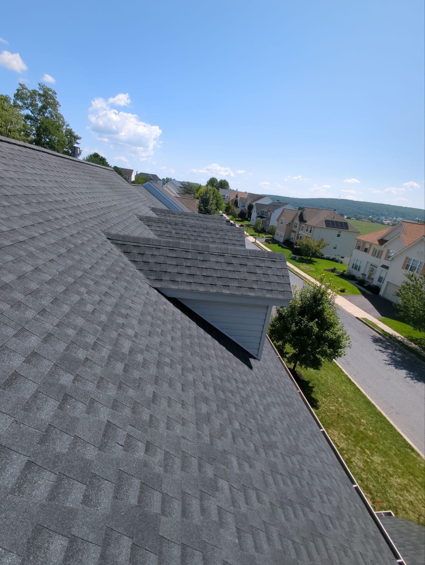 Residential asphalt shingle roof inspected and repaired on Oxford Drive in Morgantown, PA.
