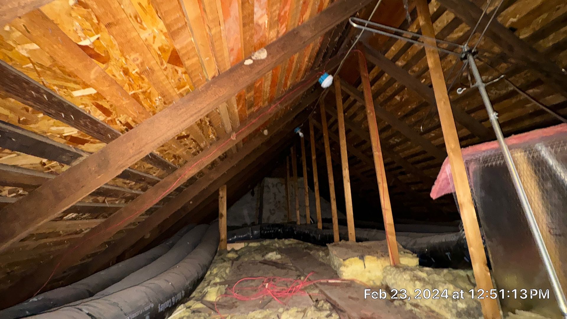 Attic inspection showing water damage beneath the roof on Reifsnyder Road in Oley, PA.
