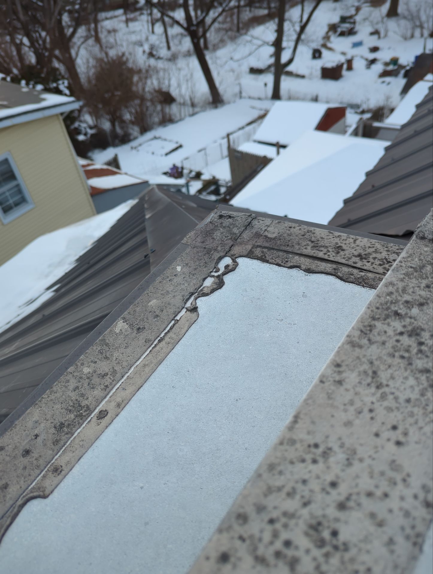 Metal roof detail on a home on East Columbia Road in Enola, PA, inspected before a roof replacement by Joyland Roofing.