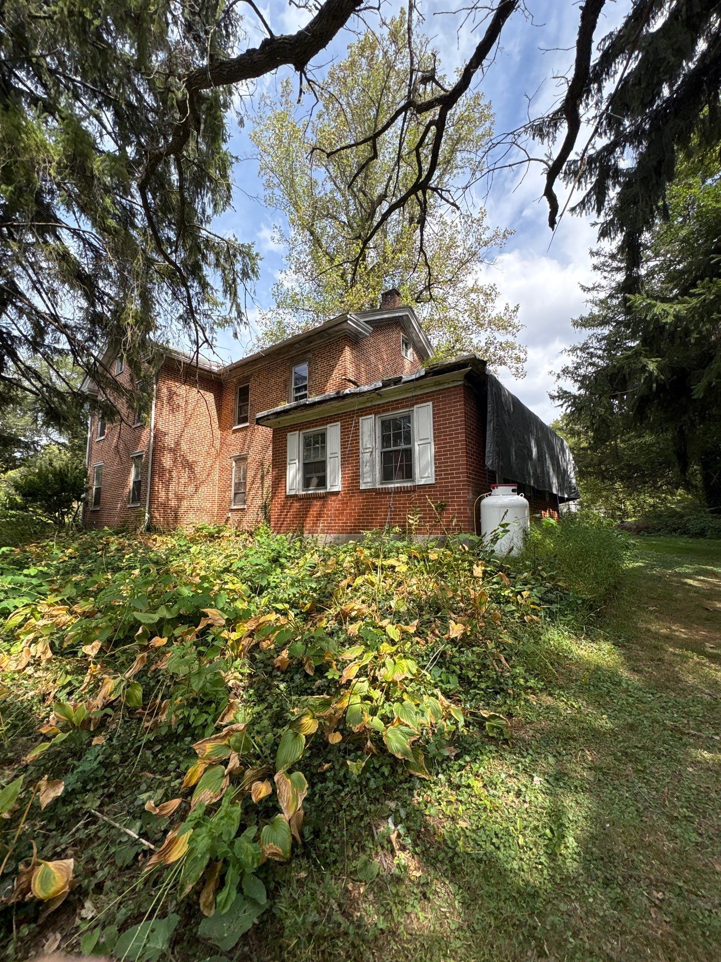 Home on Mill Road in Carlisle, PA, prepared for a residential roof replacement by Joyland Roofing.
