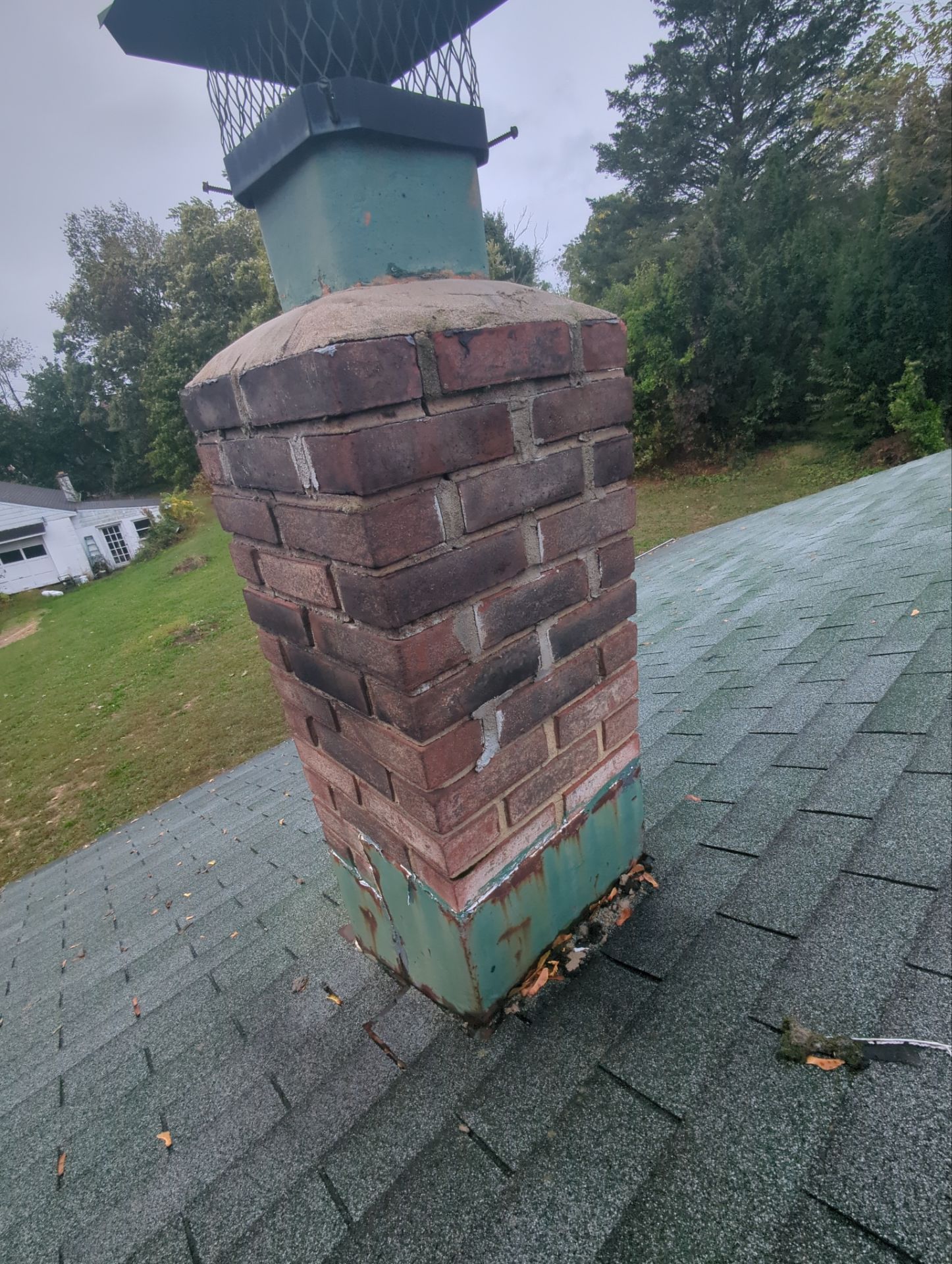 Residential roof replacement and chimney flashing project on Wertzville Road in Enola, PA by Joyland Roofing.