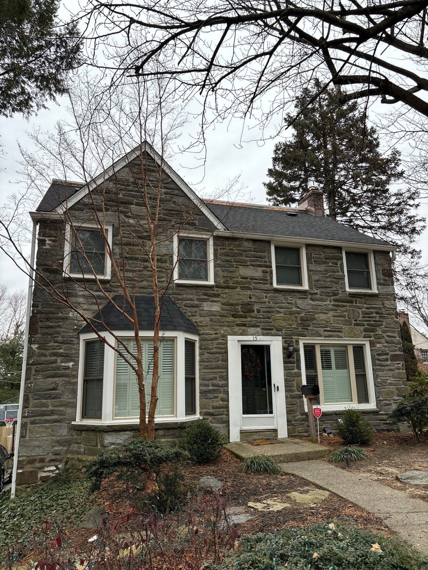 Residential roof and stone exterior inspected during a roofing project on Levering Circle in Bala Cynwyd, PA