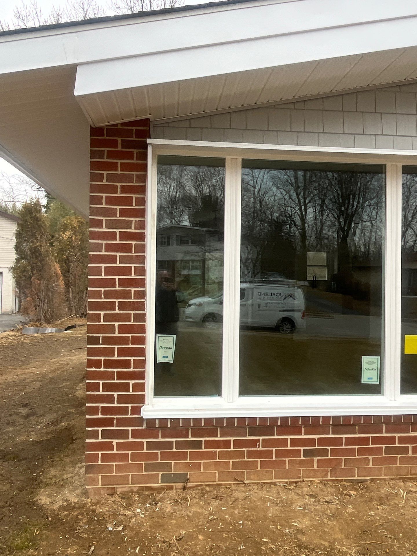 Residential roofing project exterior on Sussex Boulevard