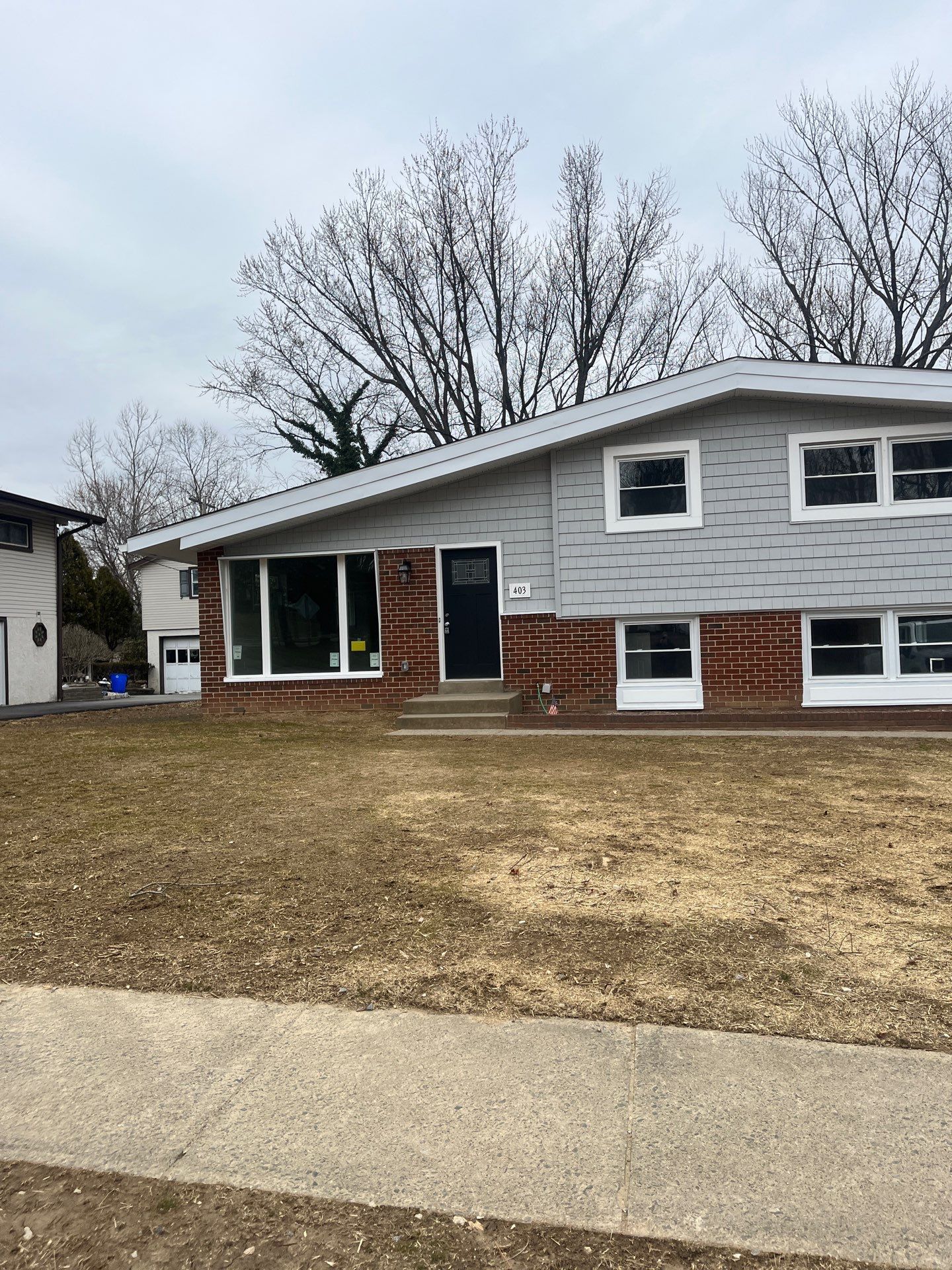 Residential home with low-slope roof on Sussex Boulevard