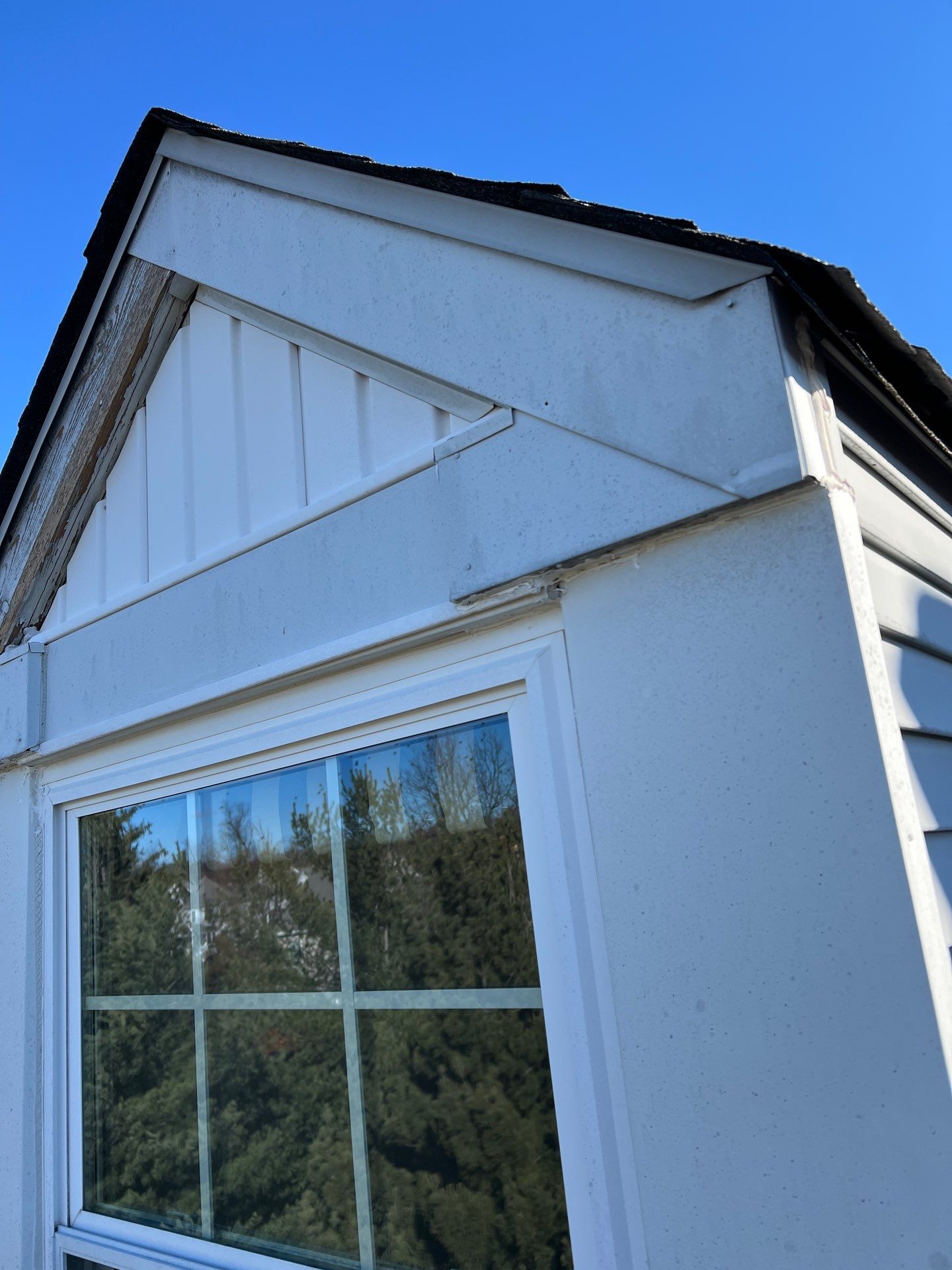 Roof and exterior inspection showing roof edge and siding on Craftsman Road in Eagleville, PA