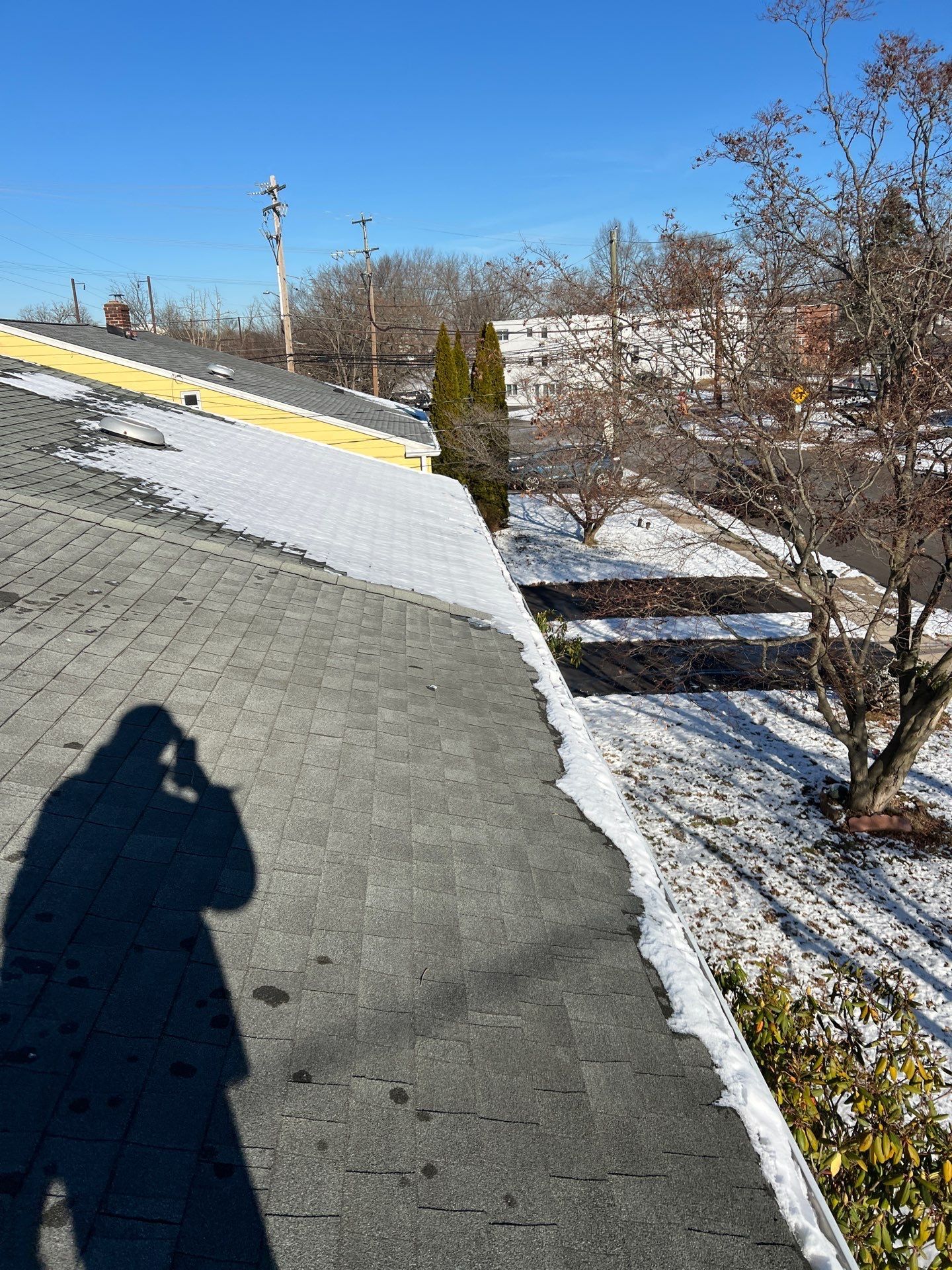 Residential asphalt shingle roof inspection on Cherry Street in Lansdale, PA