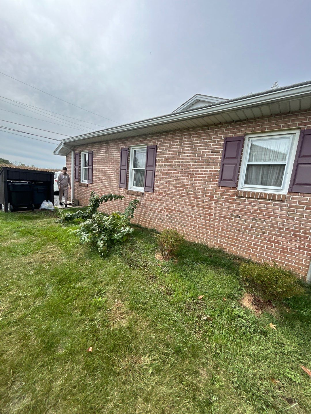 Single-story brick home on South 5th Avenue in Schaefferstown, PA undergoing a professional roof inspection by Joyland Roofing before replacement.