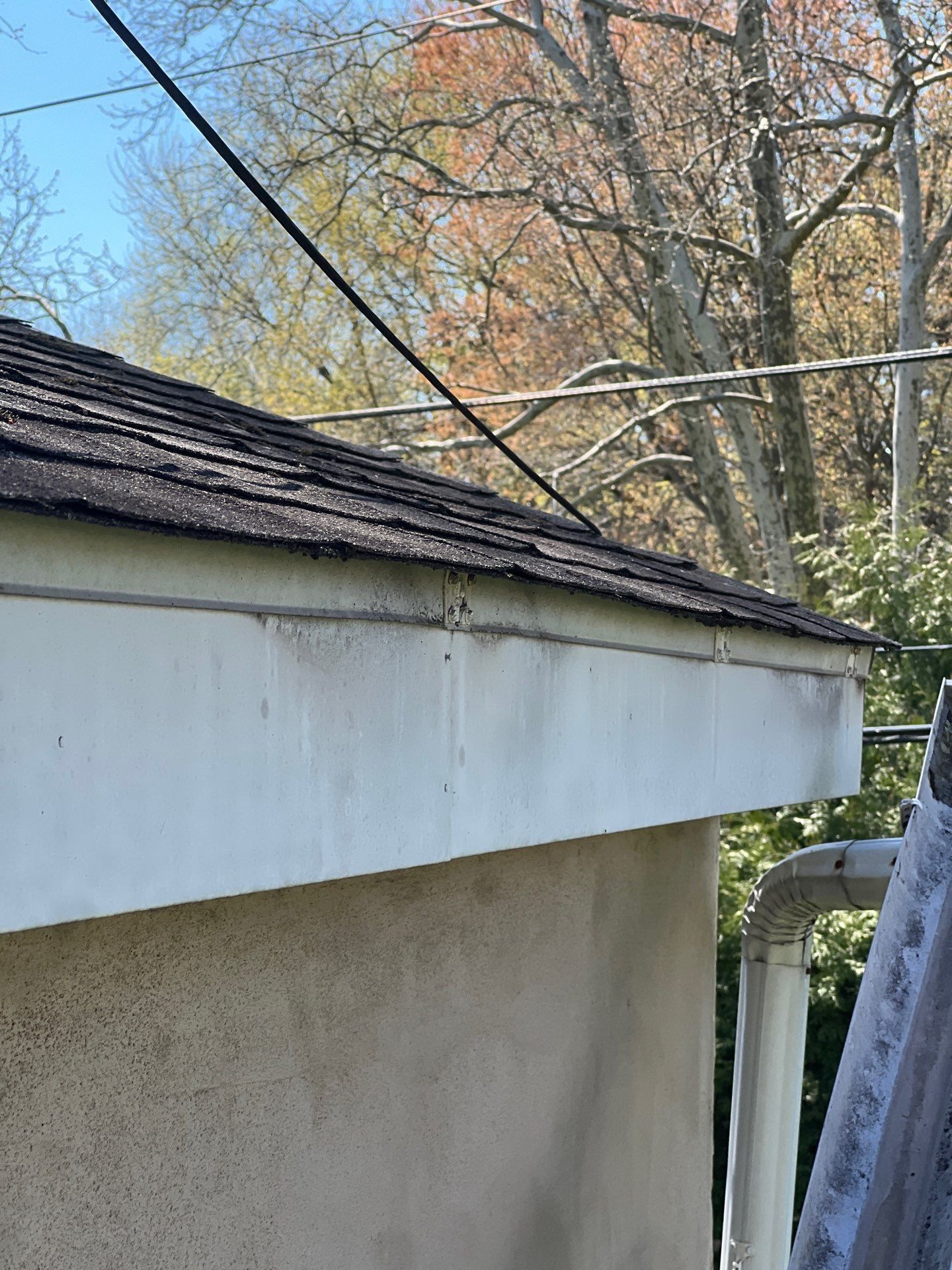 Roof repair and damaged shingles on Barcladen Road in Bryn Mawr, PA
