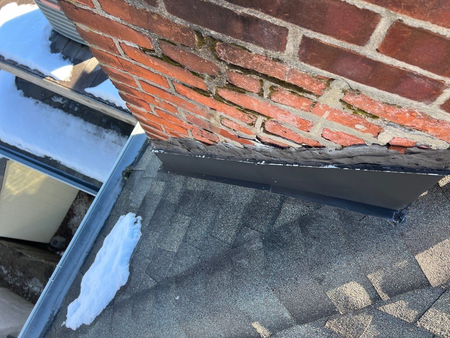 Roof shingles and chimney flashing repair on Summit Grave