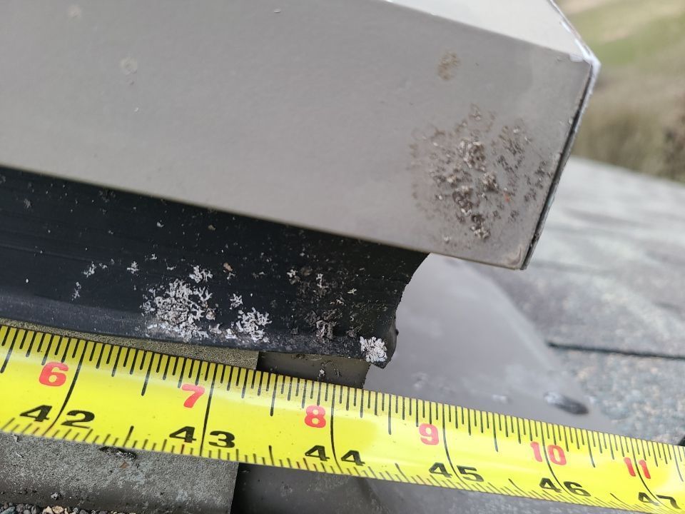 Damaged roof flashing requiring repair by Joyland Roofing on Vestra Road in North Wales, PA