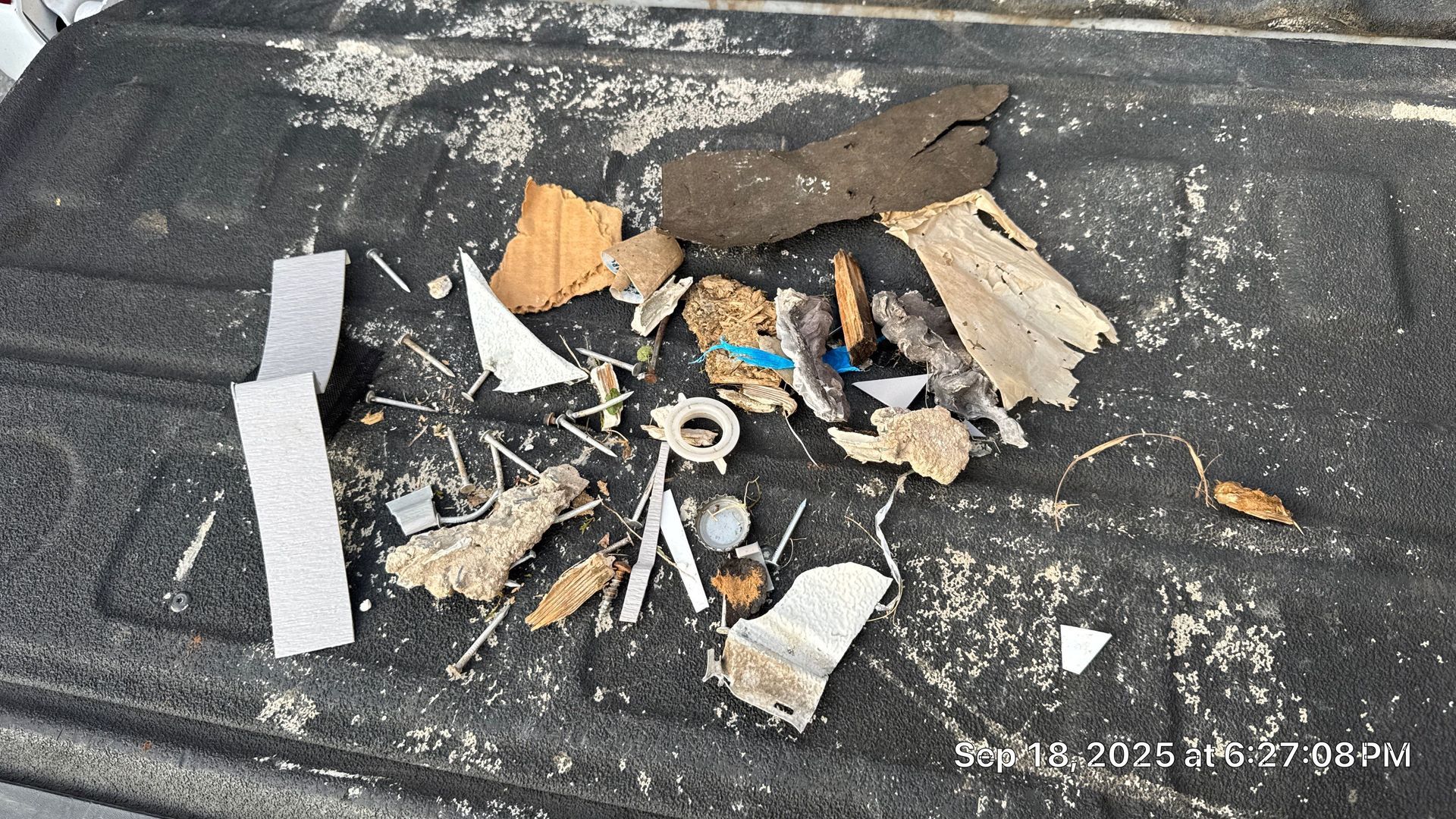 Roofing debris removed during roof repair on Summer Avenue in Horsham, PA