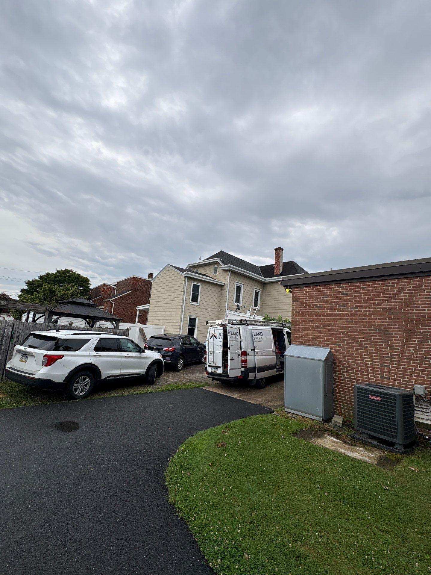 Professional roof repair project at a residential property on Locust Street in Wrightsville, PA.