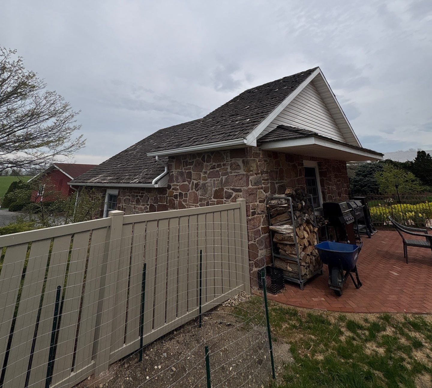 Roof repair completed on a detached stone outbuilding on Paradise Road in Dover, PA.