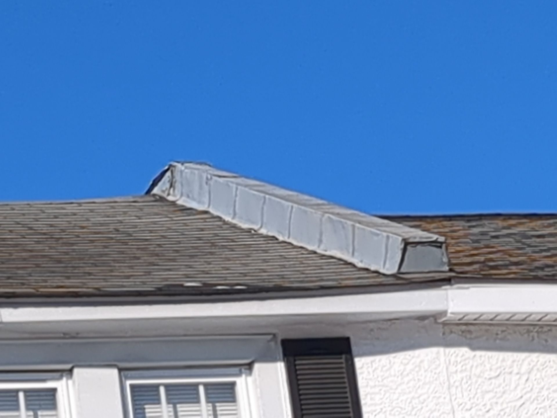 Roof ridge cap and shingle condition on Wayne Avenue