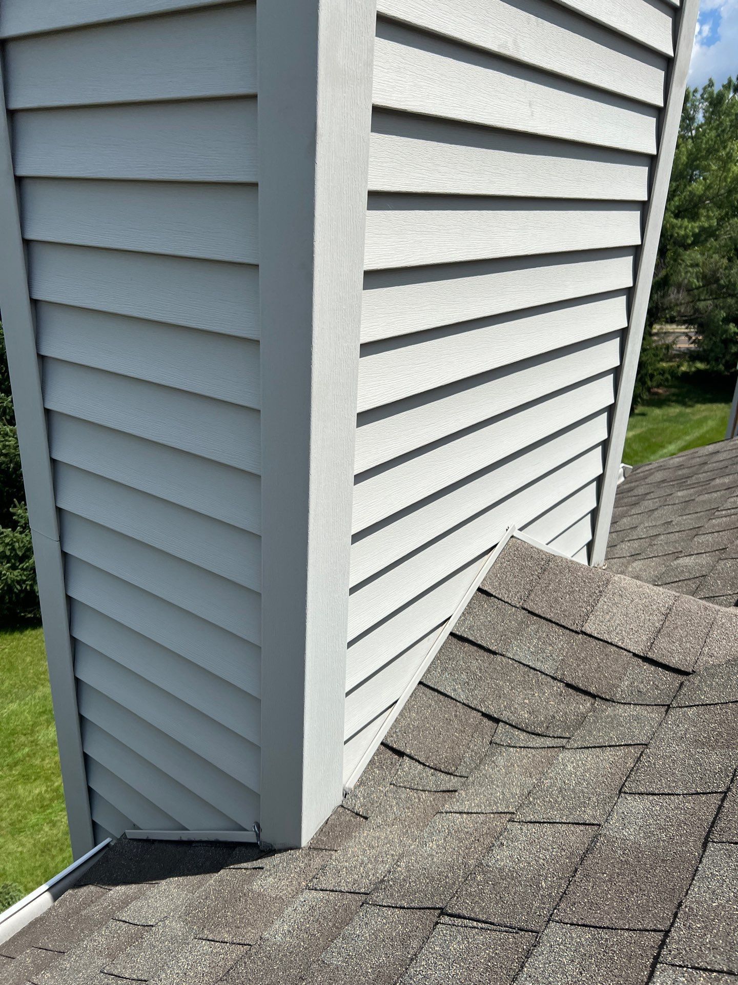 Roof-to-wall roofing problem requiring repair by Joyland Roofing on Evergreen Court in North Wales, PA