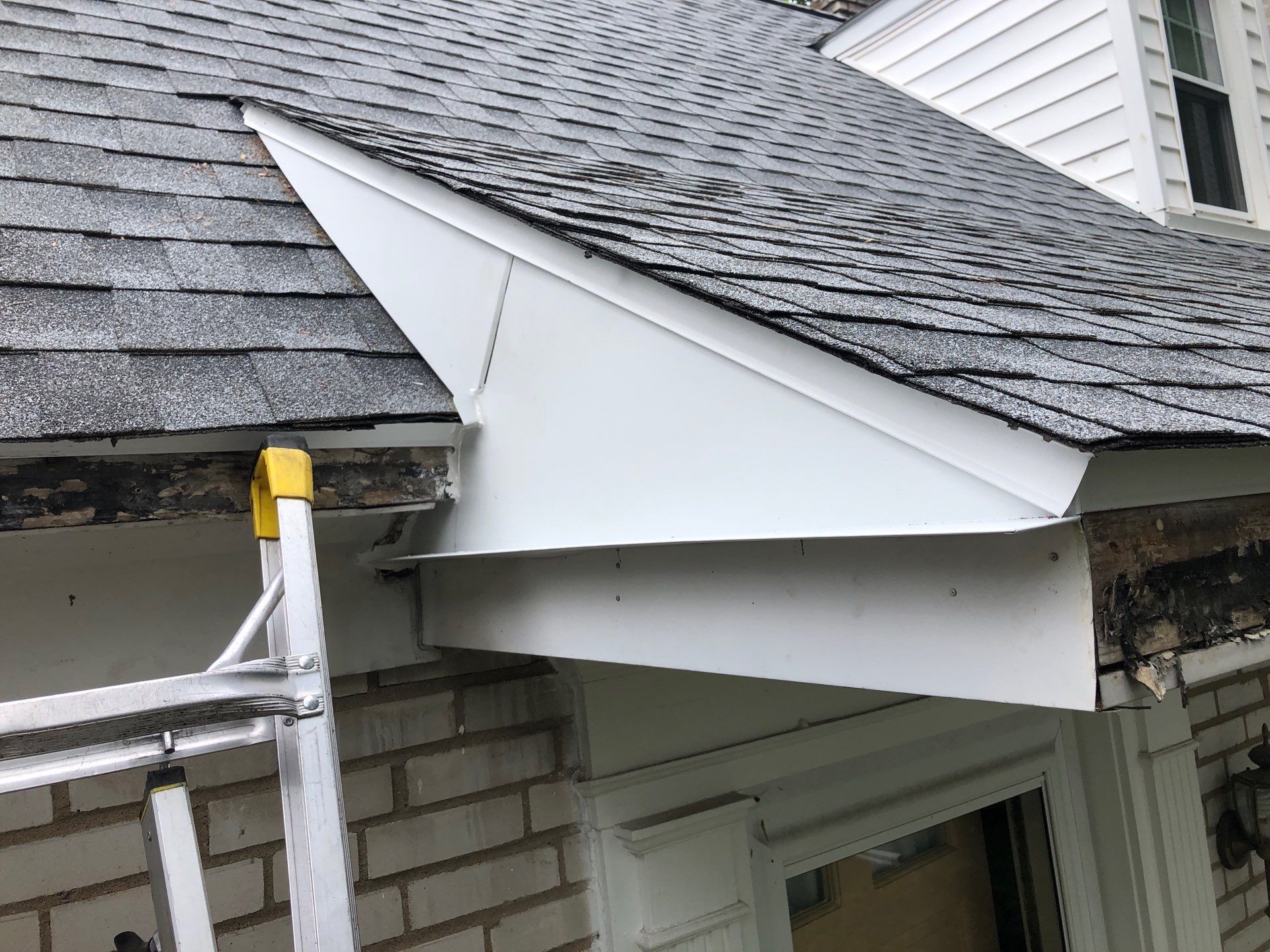 Roof repair and flashing detail at a residential home on Sunset Boulevard