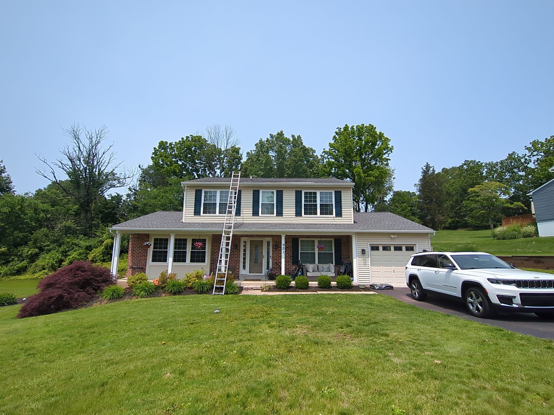 Completed roof replacement project on Crimson Lane