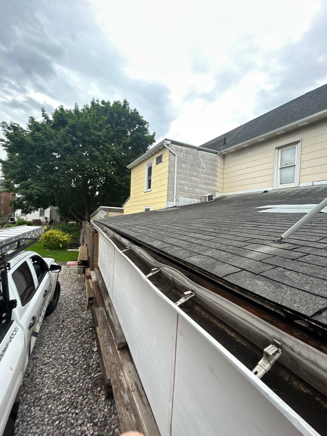 Damaged roof edge and deteriorated fascia being replaced during a roof replacement project on Poplar Street in Hanover, PA.