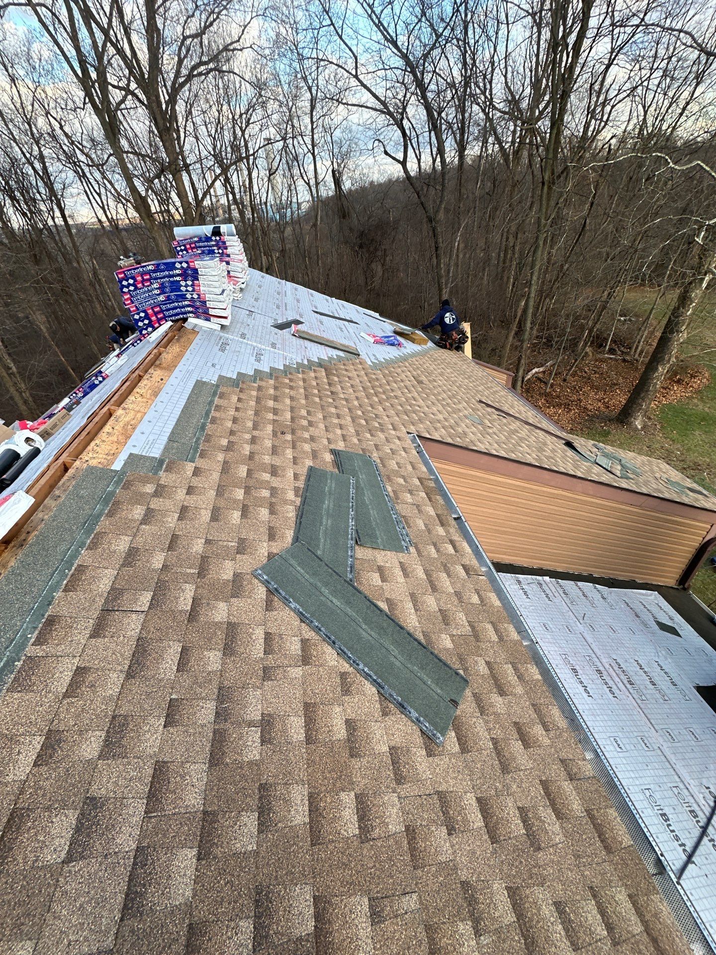 Asphalt shingle roof replacement in progress on York Haven Road in Manchester, PA by Joyland Roofing.
