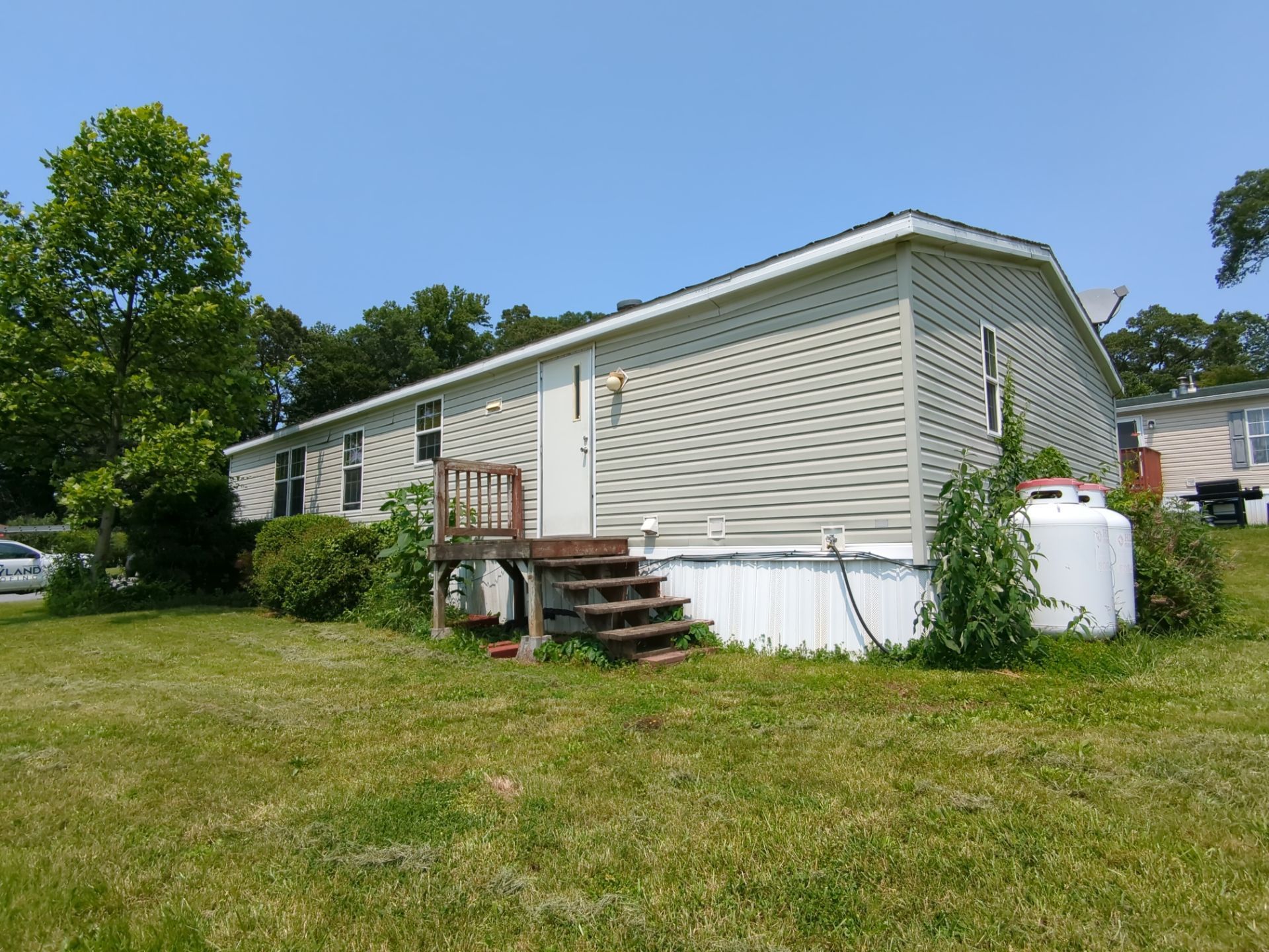 Roof replacement completed on a manufactured home on Cassel Road in Manchester, PA by Joyland Roofing.