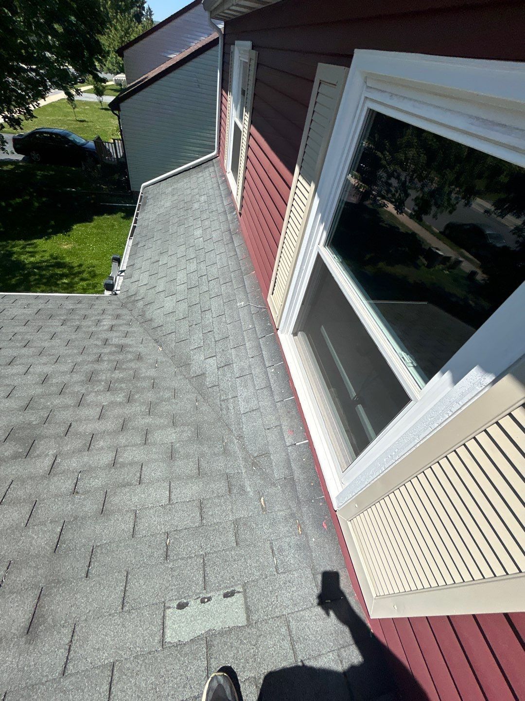Roof replacement project on Marion Terrace in Ephrata, PA featuring updated architectural shingles and improved wall-to-roof flashing for enhanced weather protection.