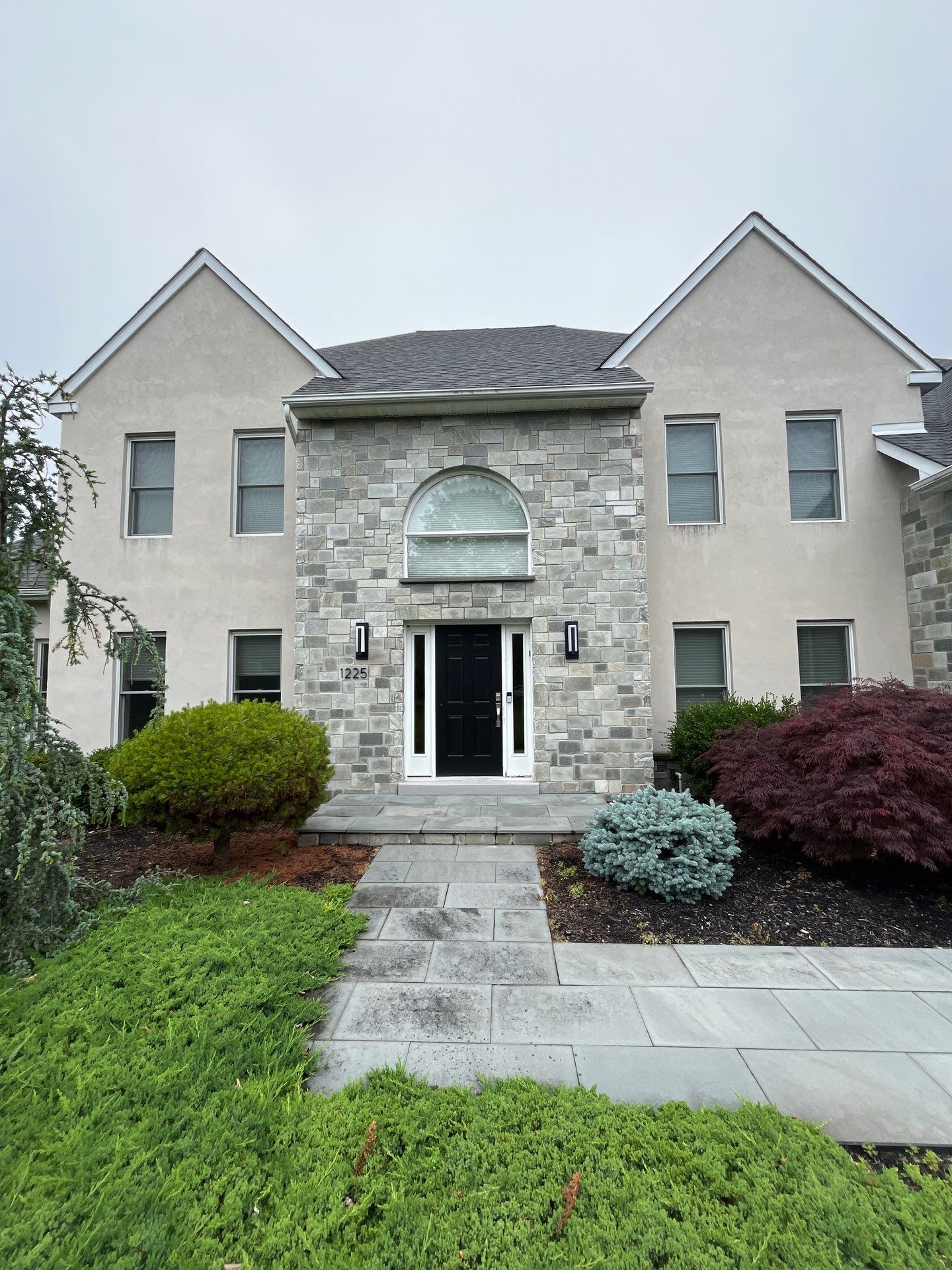 Completed residential roof replacement on New Church Street in Ambler, PA