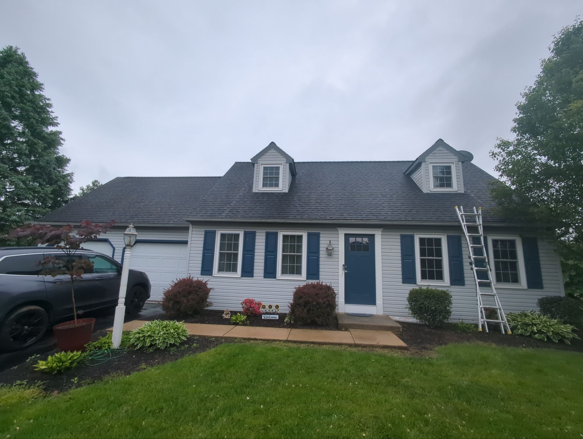 Completed asphalt shingle roof replacement on a residential home on Pine Street in East Petersburg, PA featuring upgraded roofing materials, dormers, and enhanced weather protection.