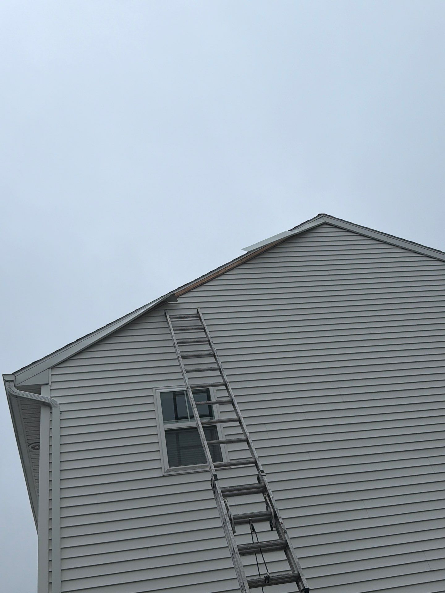 Joyland Roofing technician preparing for a roof replacement on Bald Eagle Boulevard in Carlisle, PA.