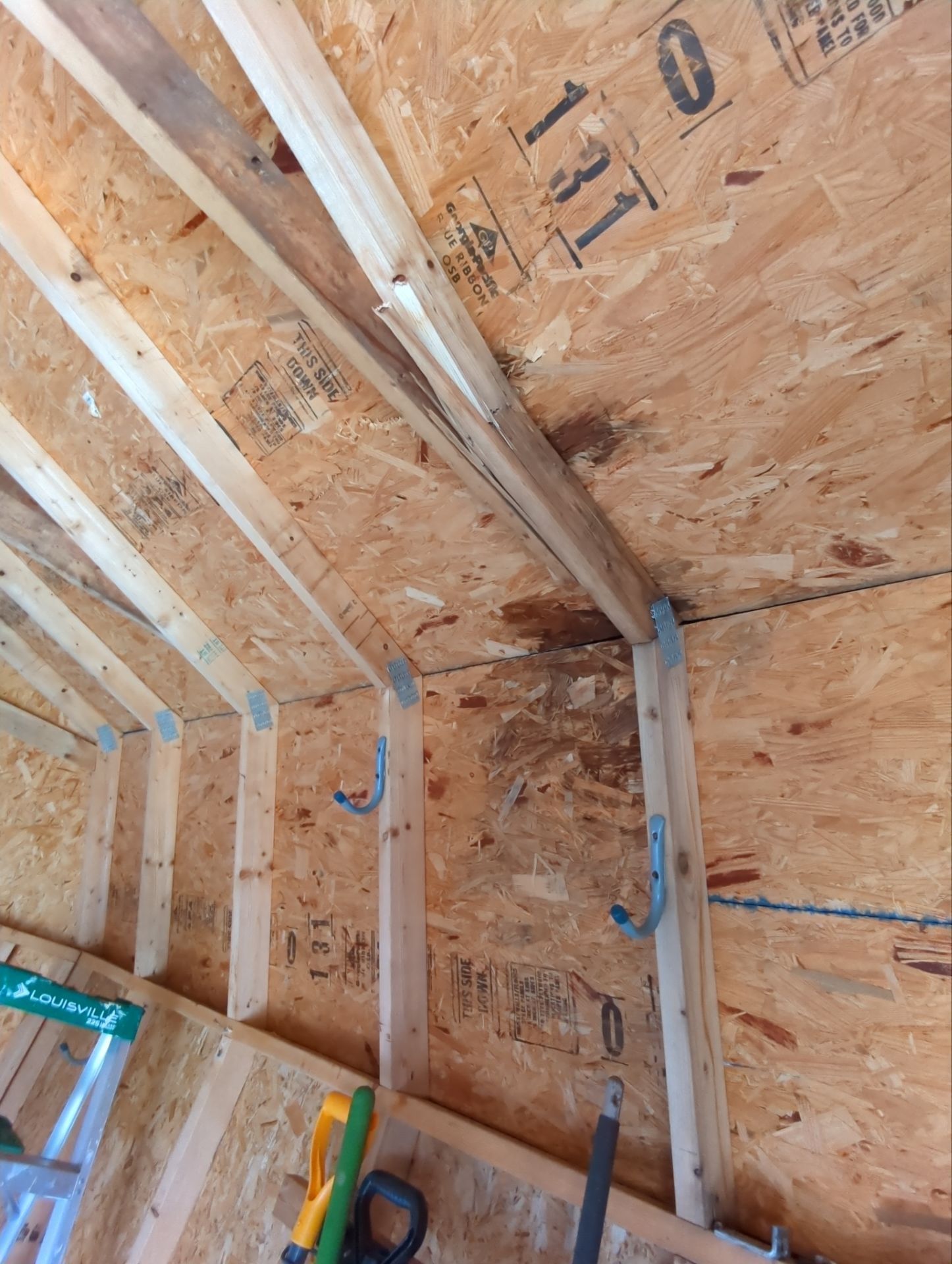 Roof decking replacement and new wood sheathing installed during a roofing project on Brentwood Drive