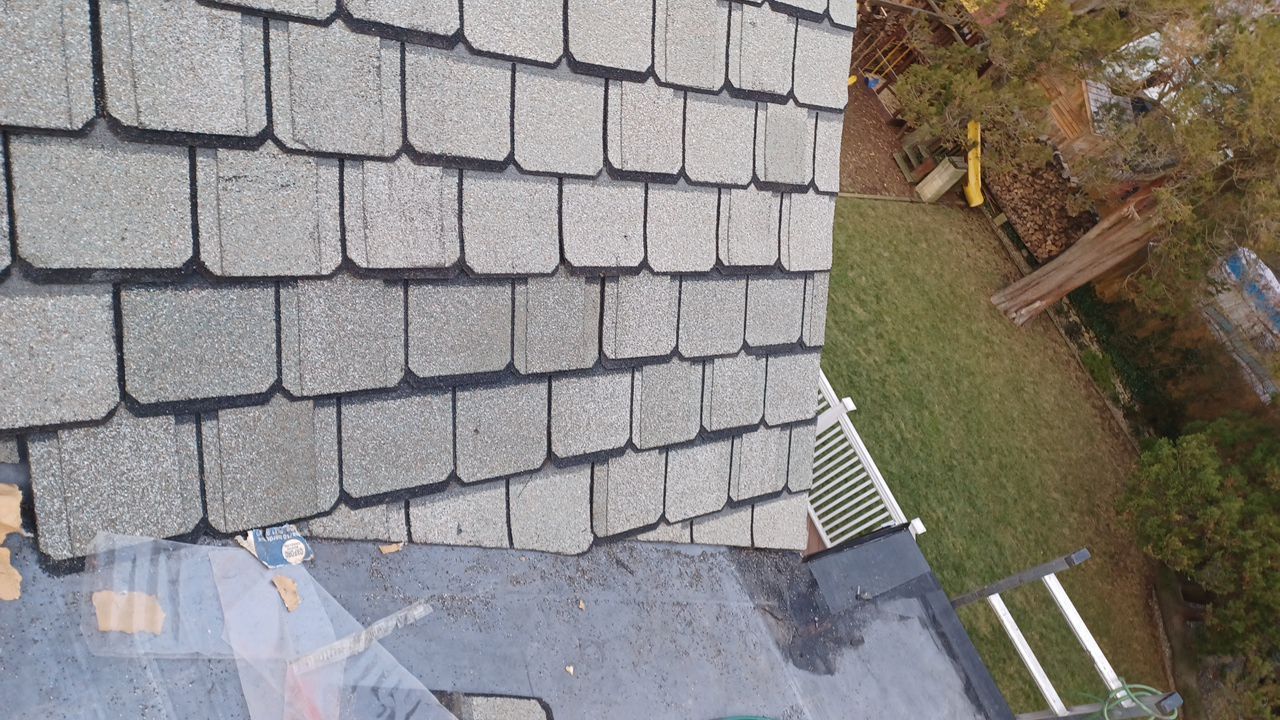 New asphalt roof shingles and flashing installation on Dudley Avenue in Narberth, PA