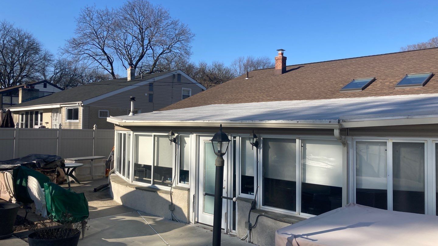 Completed asphalt shingle roof replacement with skylights on Wistar Drive in Wyncote, PA