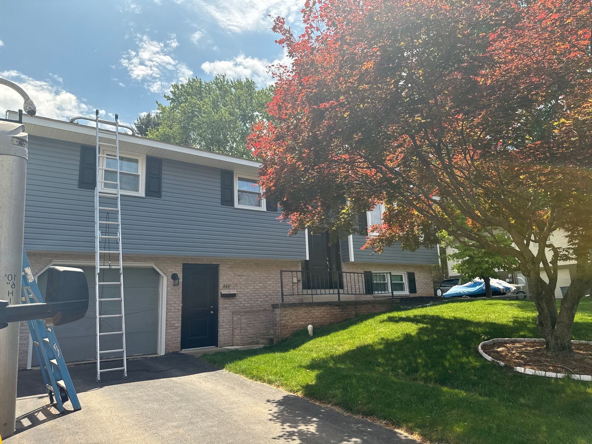Residential roof replacement project on Snyder Avenue in Elizabethtown, PA featuring a newly installed asphalt shingle roofing system on a split-level home.