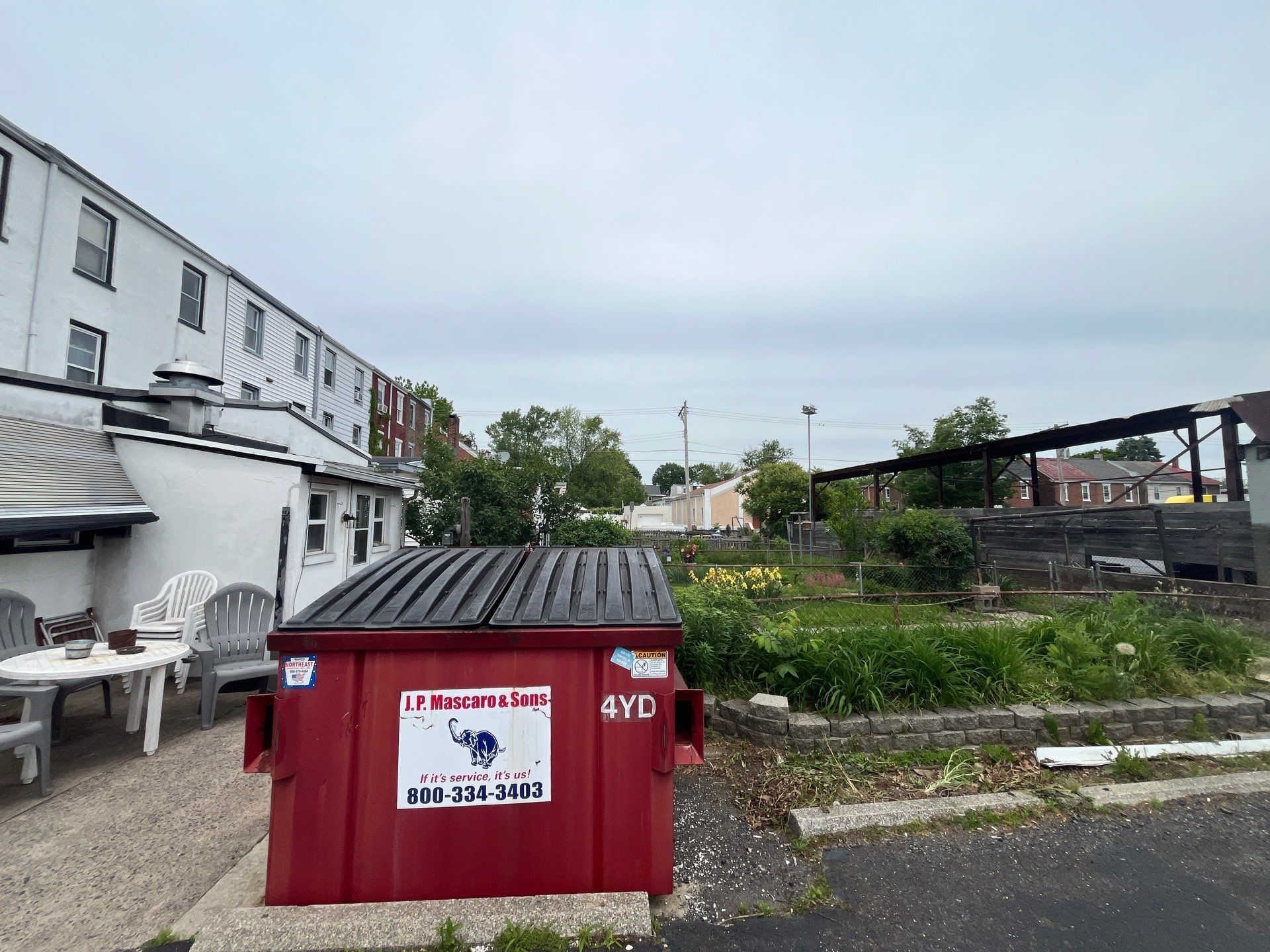 Roofing replacement project cleanup area on South Franklin Street