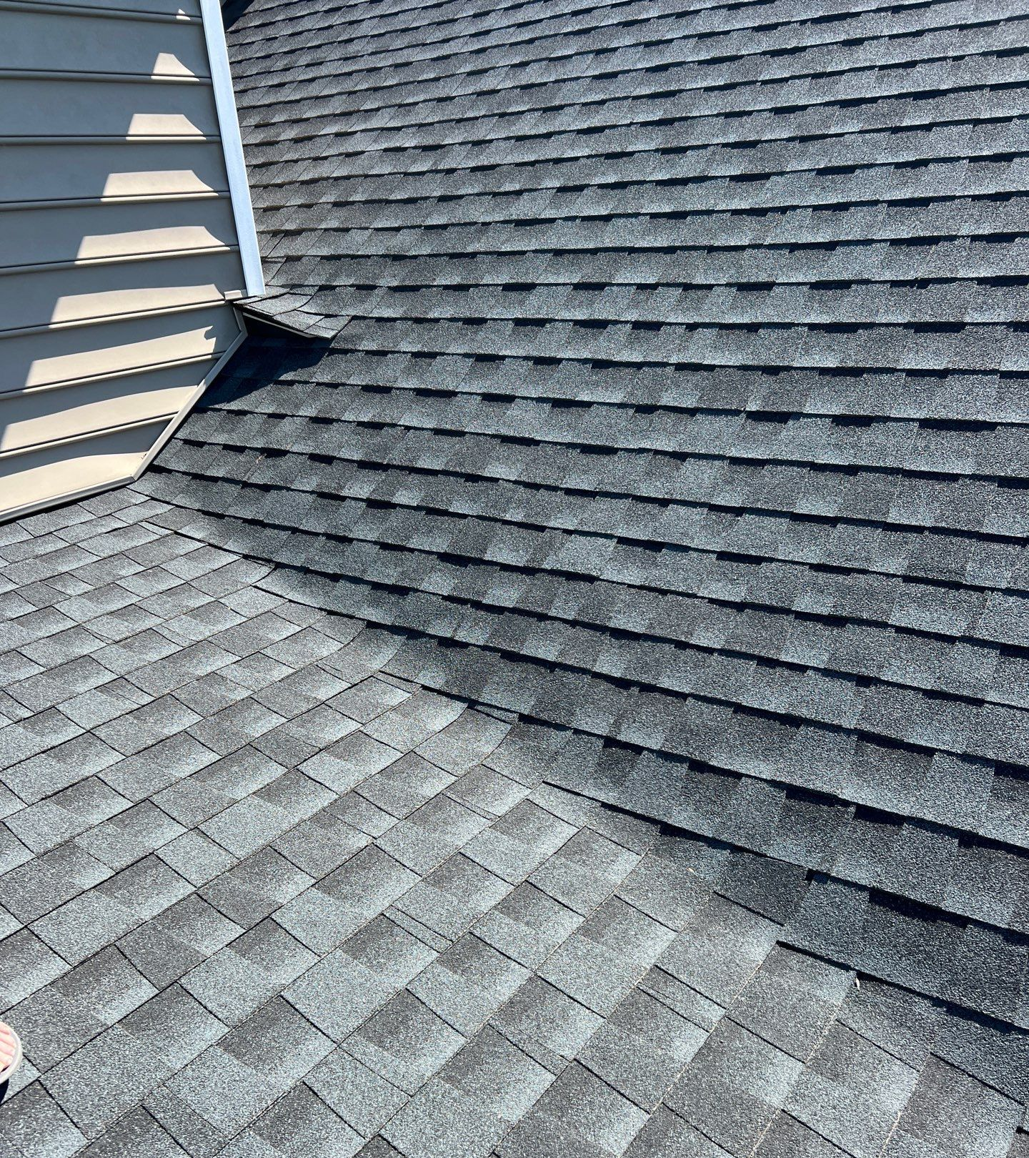 Completed roof repair on Republic Terrace in East Petersburg, PA featuring repaired asphalt shingles and flashing details.
