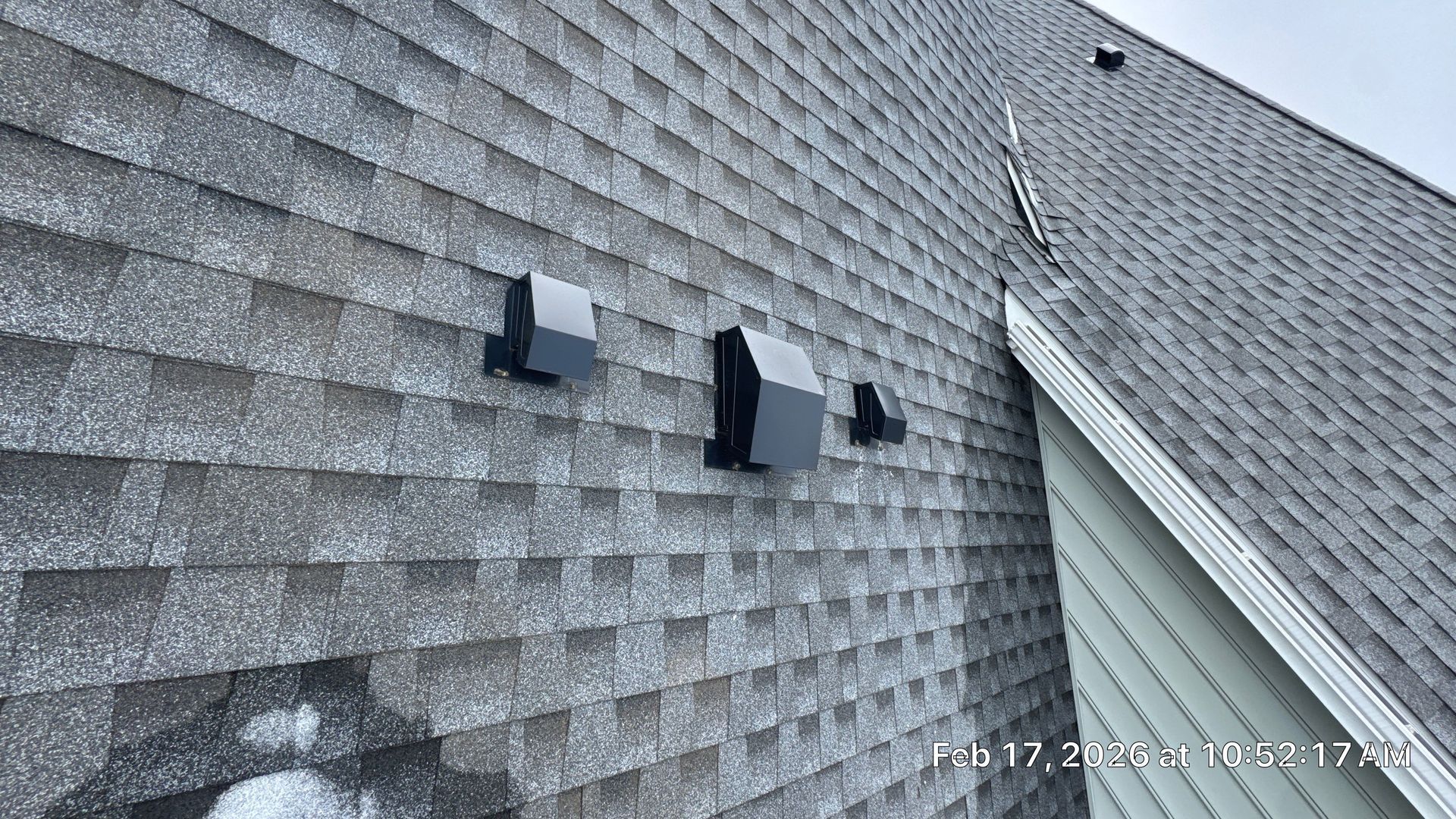 Roof vent flashing repair and waterproofing inspection on an asphalt shingle roof in East Petersburg, PA by Joyland Roofing.