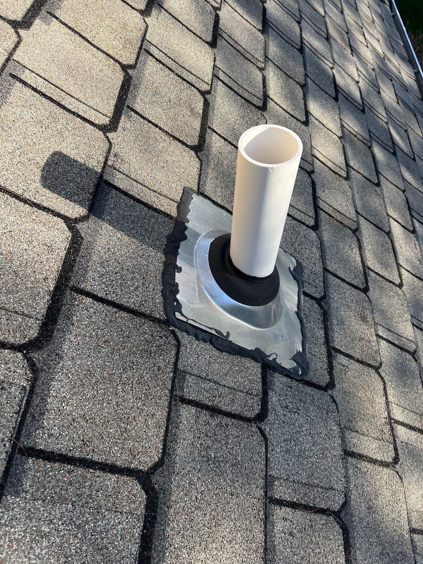 Roof vent pipe with flashing and sealant requiring repair on Paradise Drive in Ambler, PA