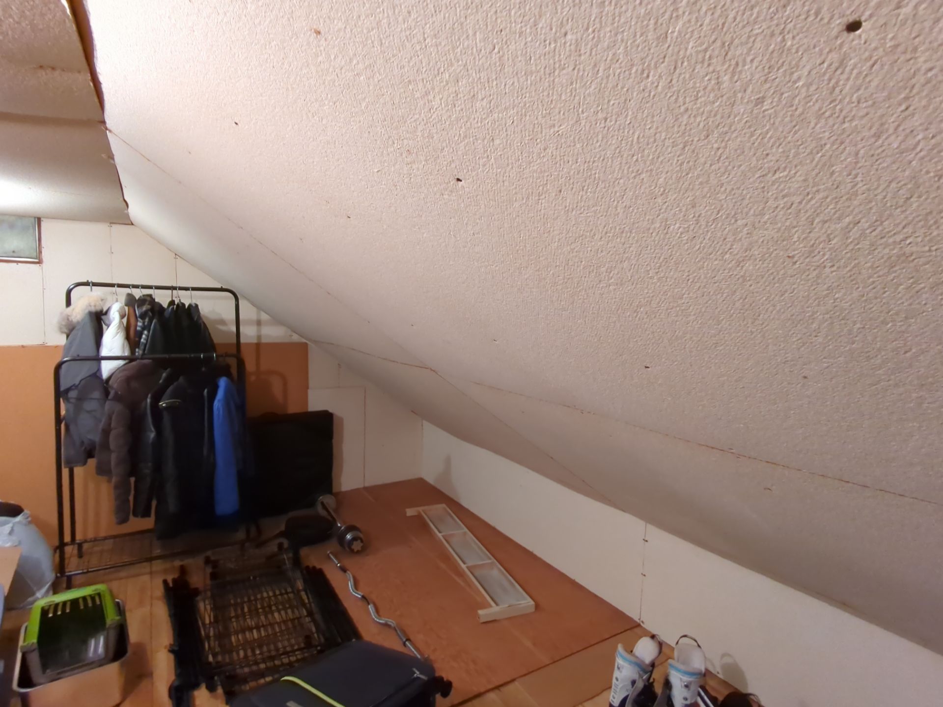 Interior view beneath a sloped roof on Nash Avenue in Lansdale, PA showing the finished ceiling and wall surfaces within the upper-level living area