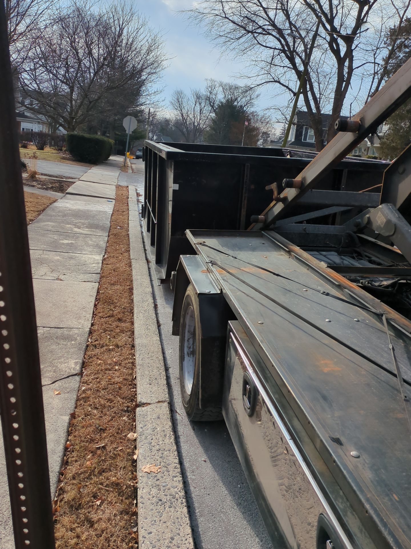 Roofing debris removal trailer used during a roofing project on South Rolling Road in Springfield PA