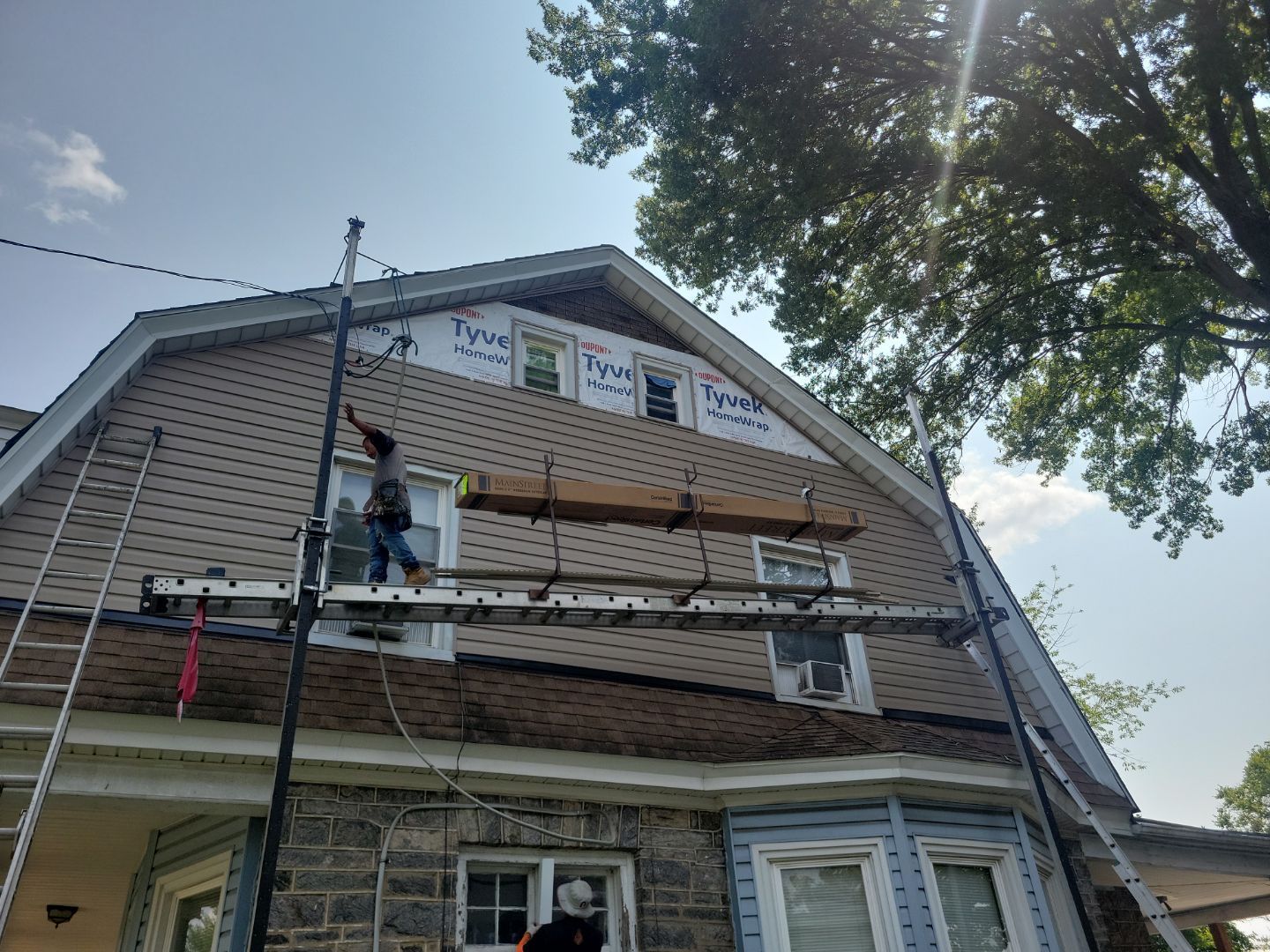 Roofing and siding installation work in progress on a Ridley Park PA home