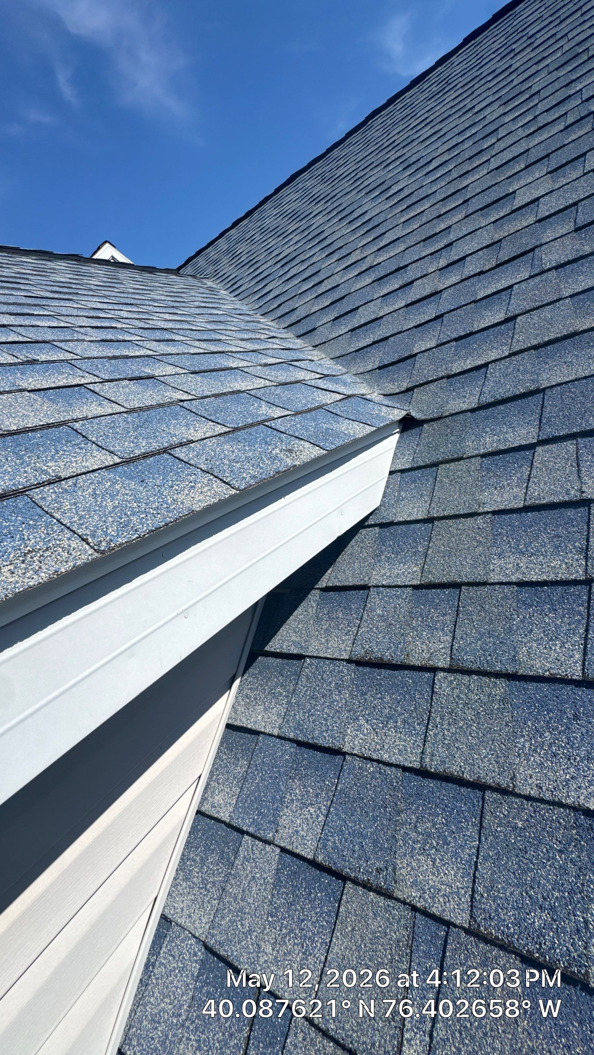 Close-up of an asphalt shingle roof valley inspected on South Homestead Drive for proper installation and condition.