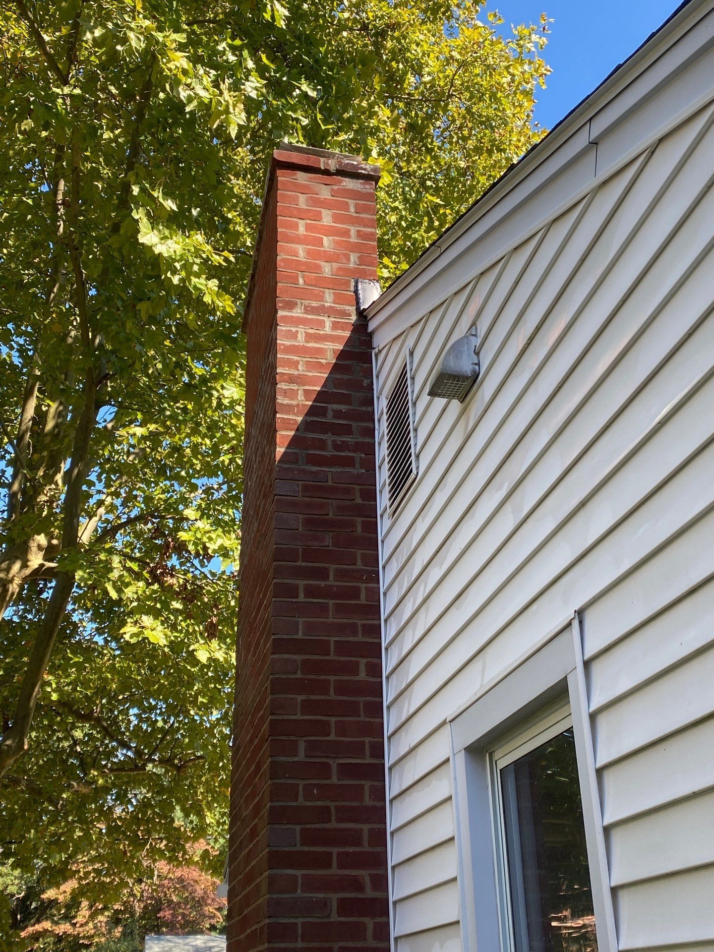 Brick chimney inspected for masonry condition on South Stoner Avenue in Shiremanstown, PA.