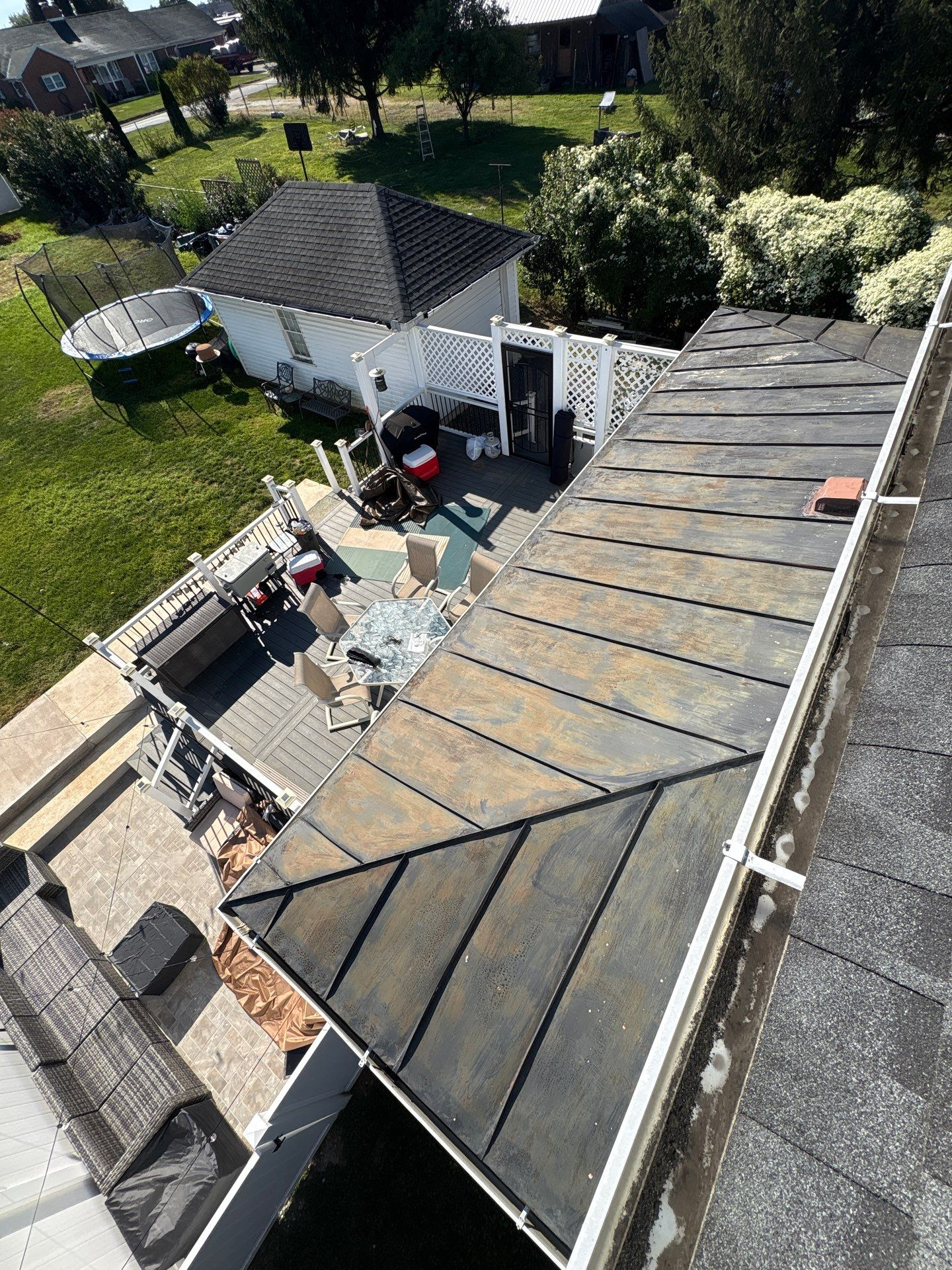Standing seam metal porch roof inspected by Joyland Roofing at a home in Shrewsbury, PA.