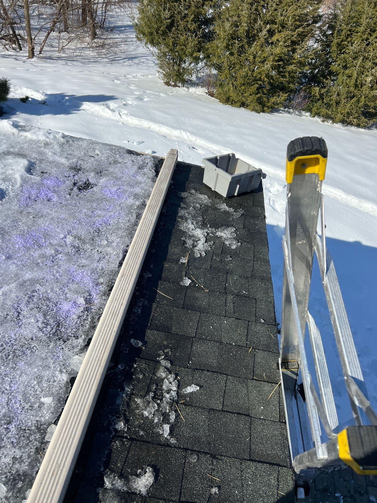 Roof repair completed on an asphalt shingle roof on Sweitzer Road in Sinking Spring, PA during winter conditions by Joyland Roofing.