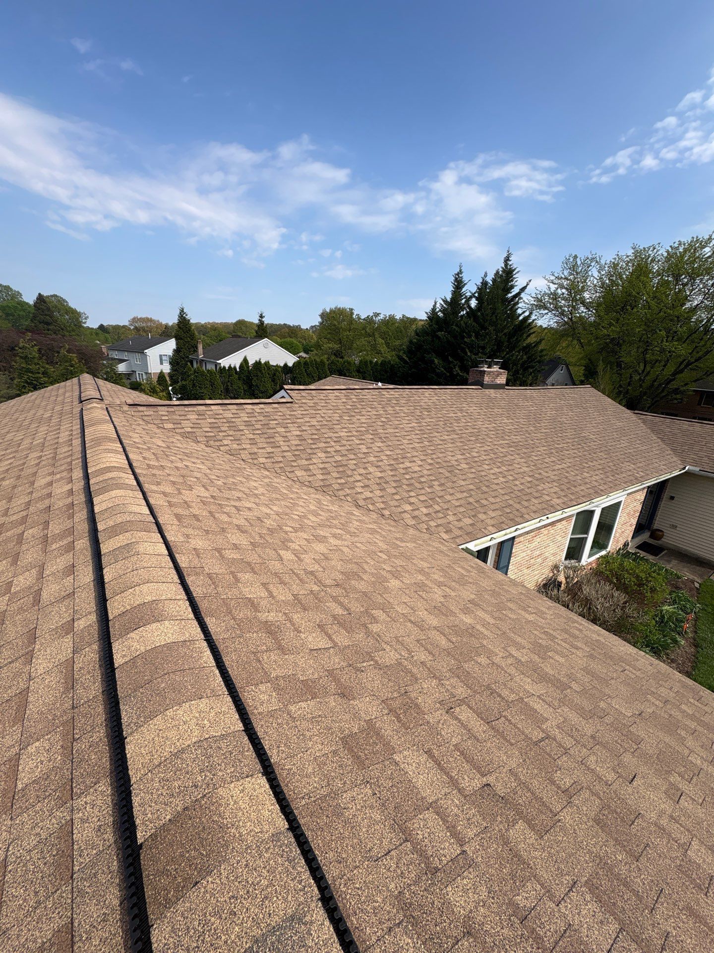 Completed asphalt shingle roof replacement on a home along Tewkesbury Drive in Reading, PA.